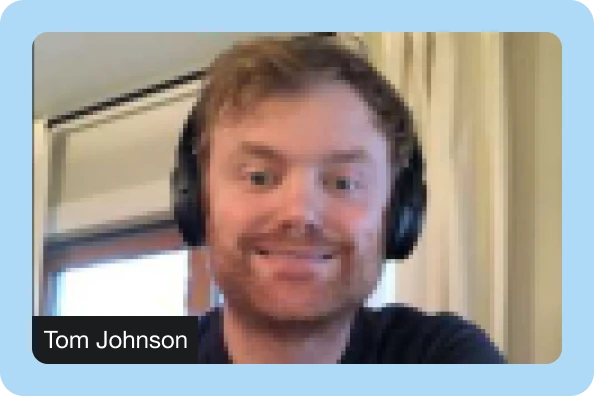 Company culture image depicting team members engaged in a brainstorming session